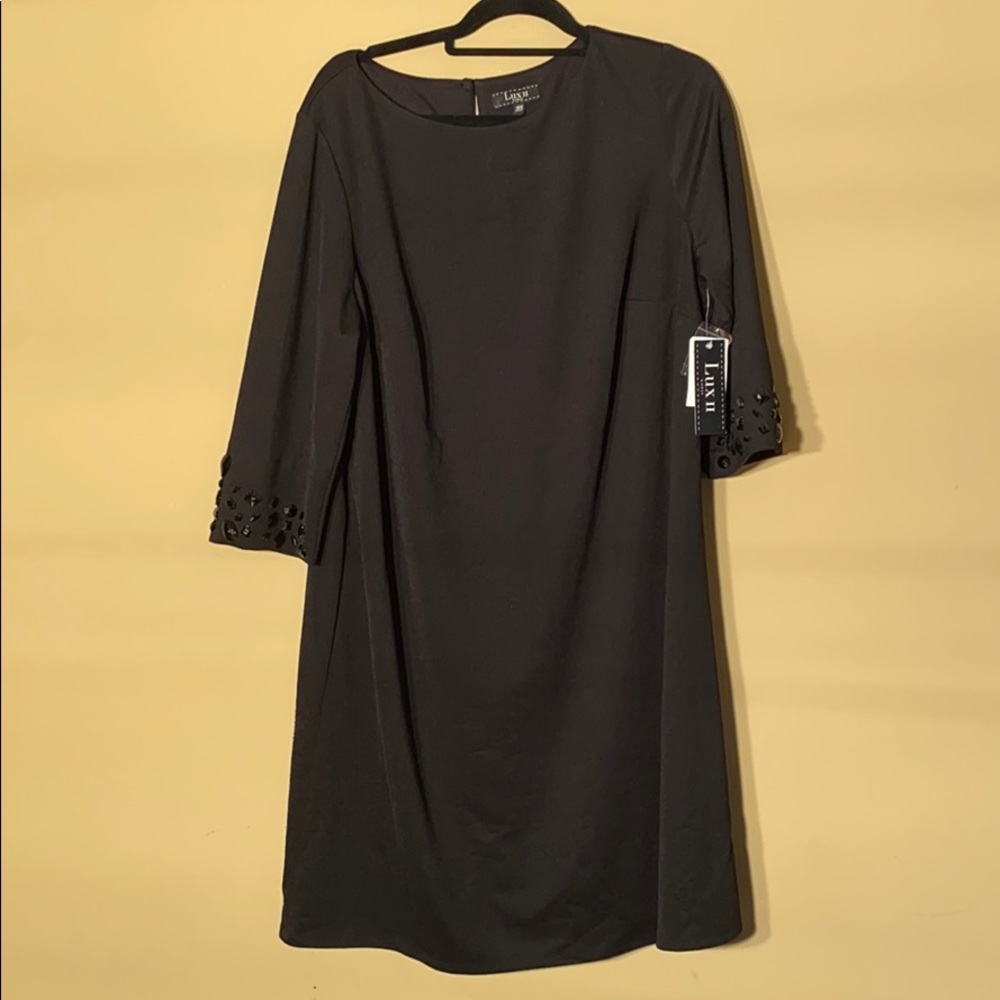 Black midi dress with jewels
